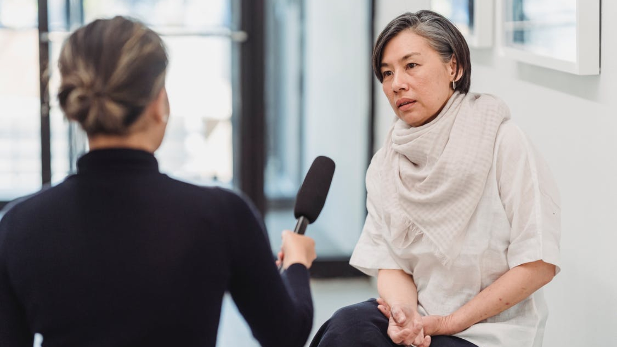 Woman being interviewed